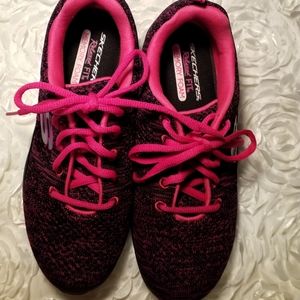 Pink and black Sketcher sneakers